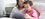 Child and woman looking at tablet